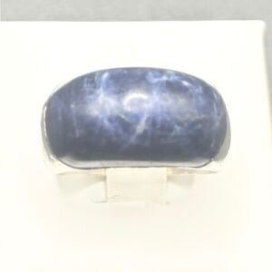 Size 9 Sterling Silver ring with a Lg Sodalight dark blue stone  has weight to
